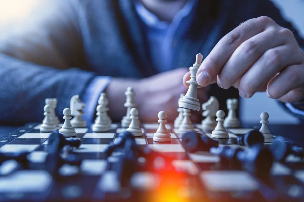 Chess game—a steady hand and attention in the moment, beyond performance alone.